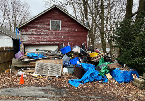 Does the cost of using a particular type of junk removal service include liability coverage in case something goes wrong during the job?